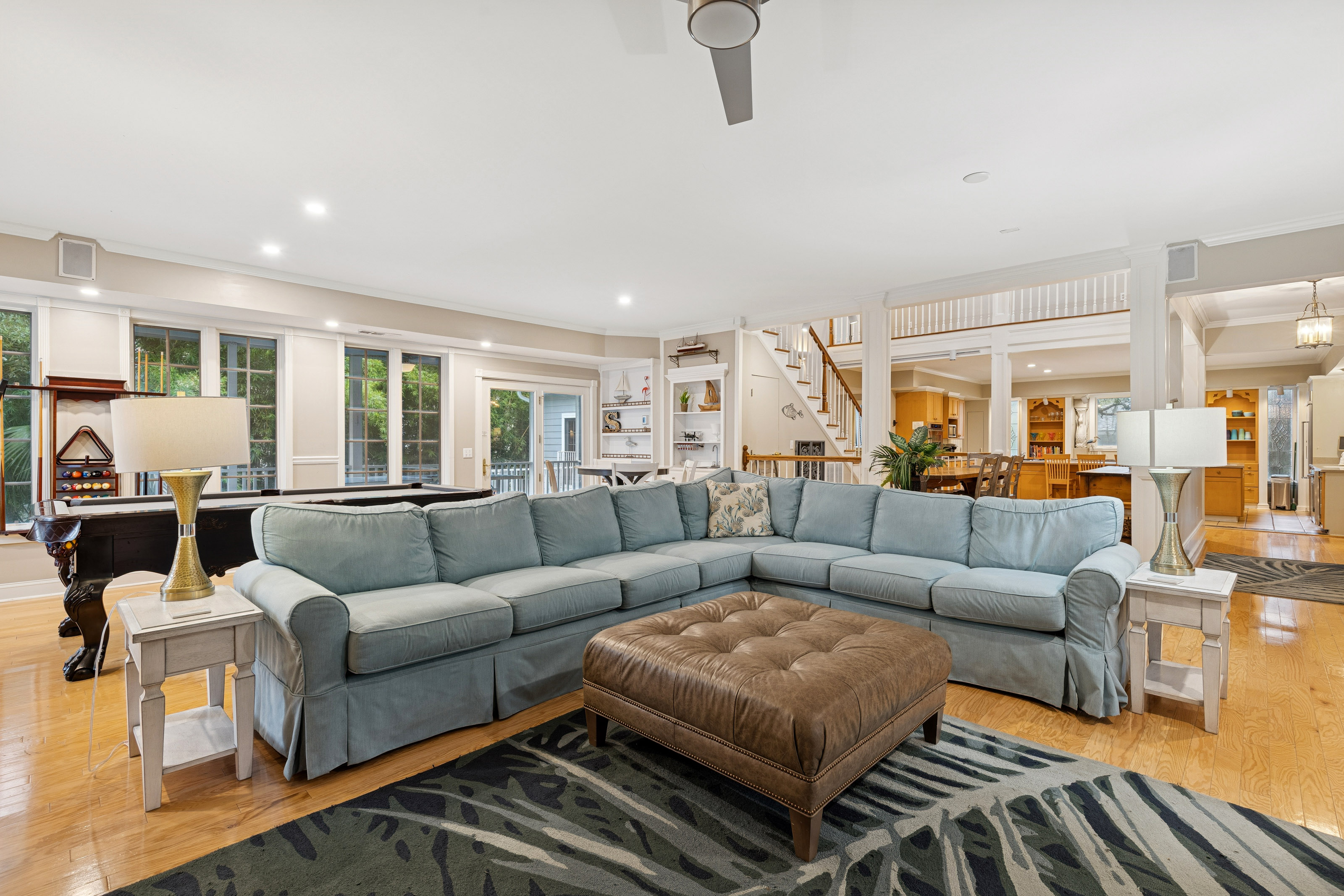 66 Dune Lane | Main Living Room w/ large sofa & Pool Table