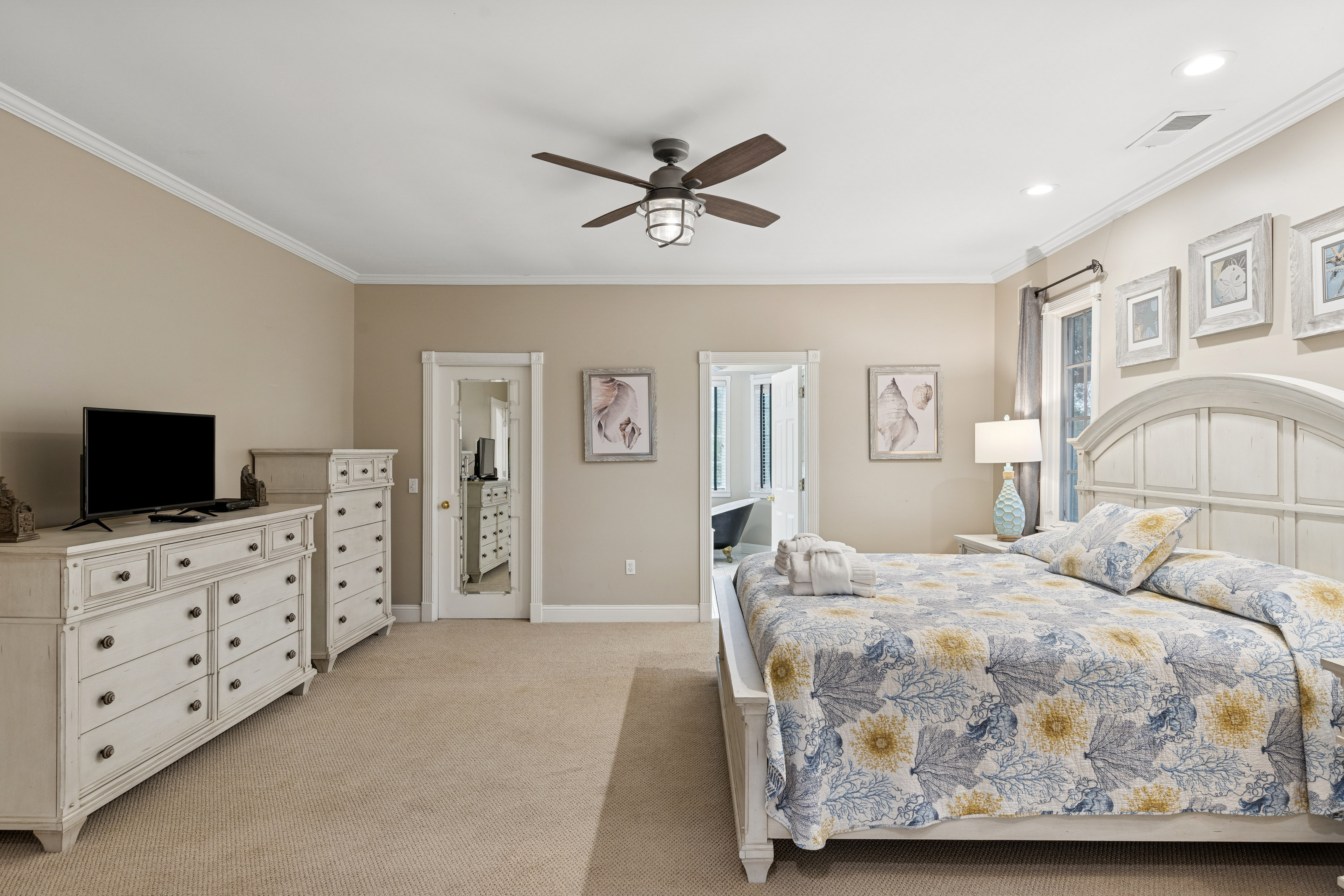 66 Dune Lane | Bedroom 5 King bed, seating area, ensuite bathroo
