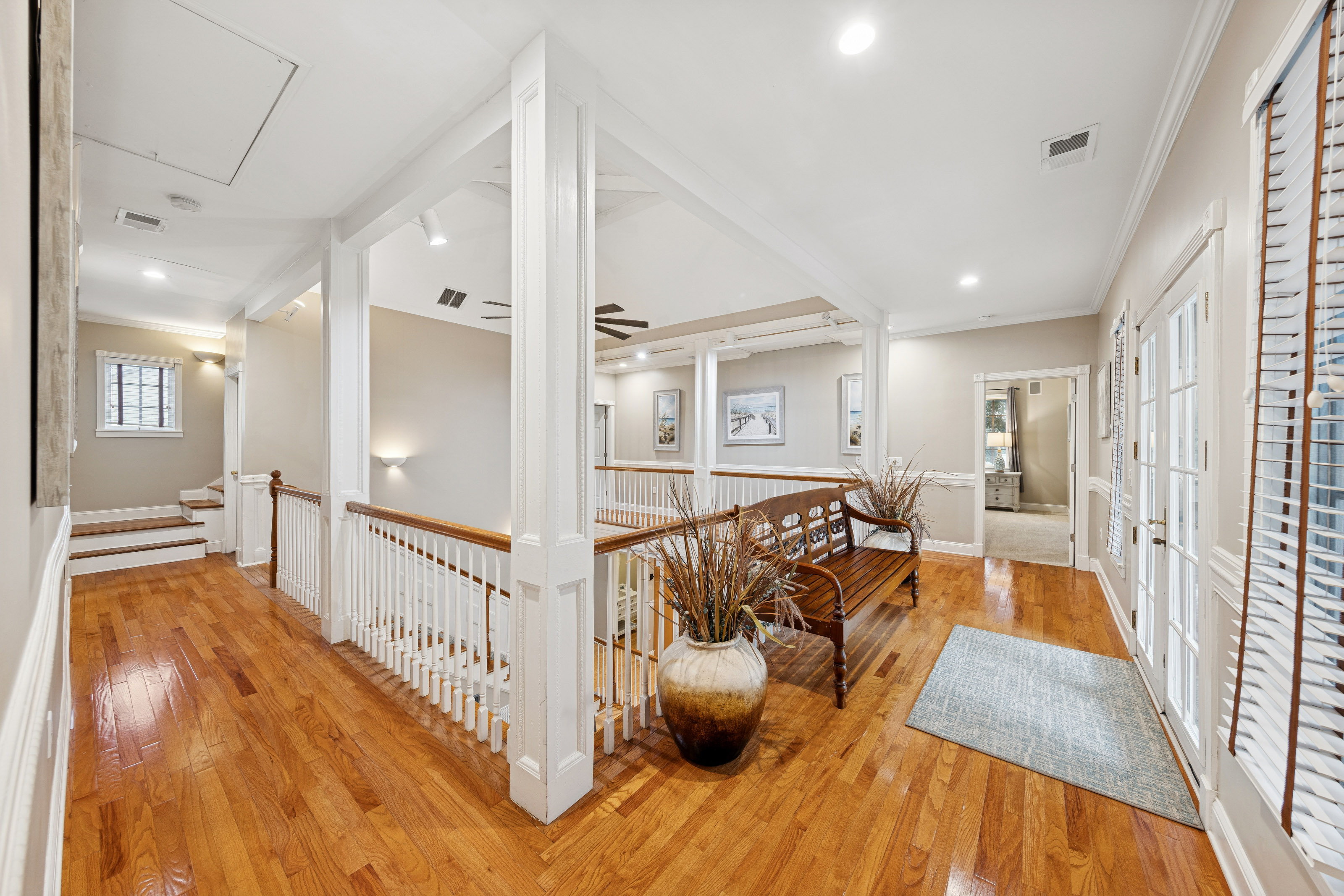 66 Dune Lane | Upper level walkway w/ bench seating