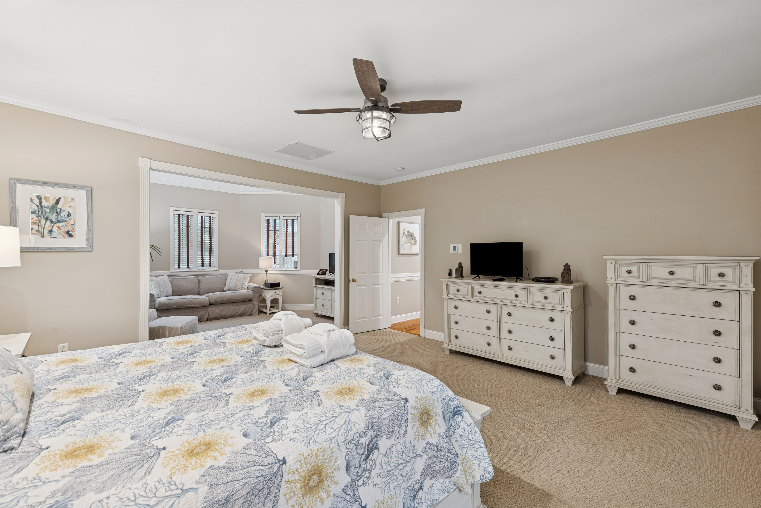 66 Dune Lane | Bedroom 5 King bed, seating area, ensuite bathroo