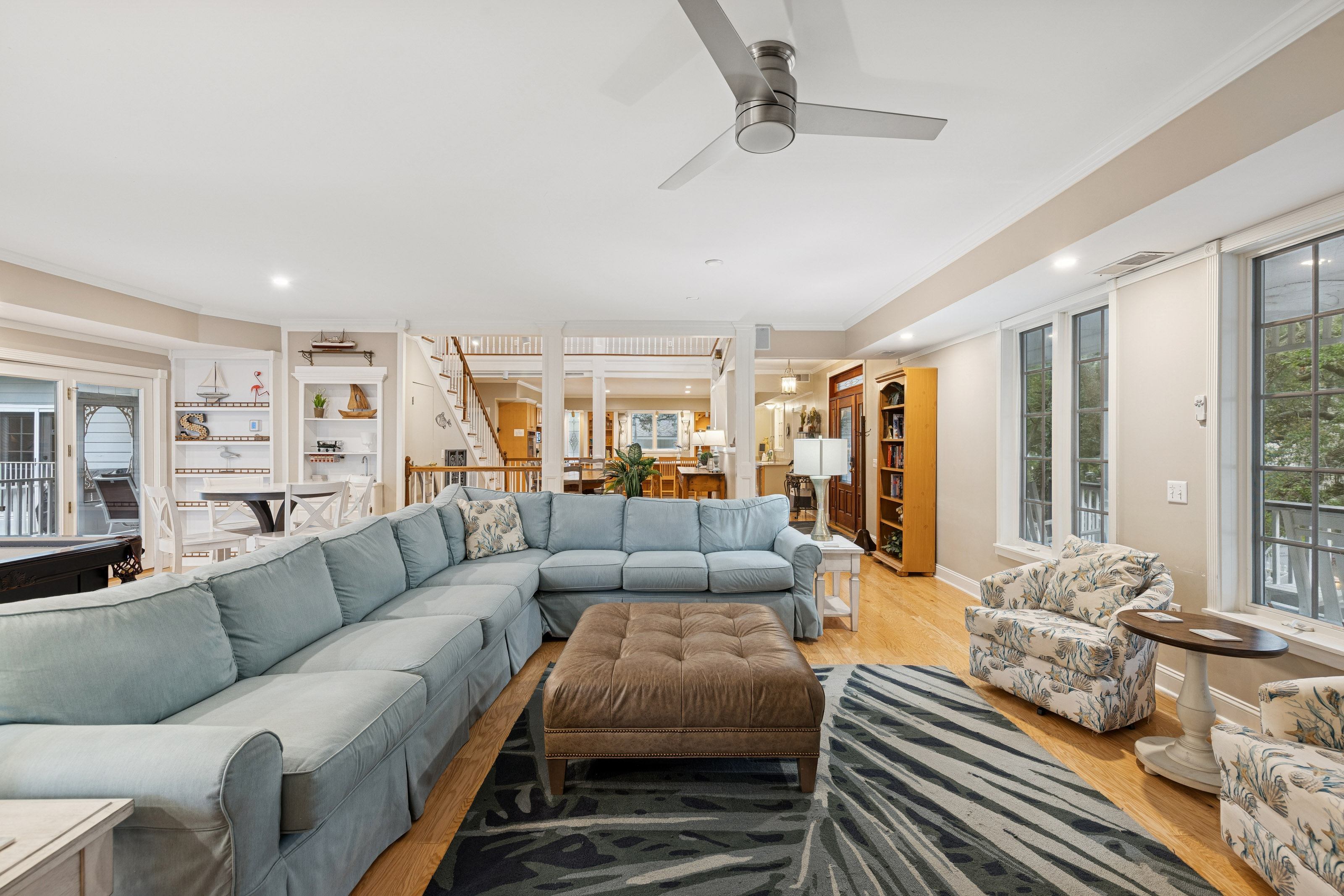 66 Dune Lane | Main Living Room w/ large sofa & Pool Table