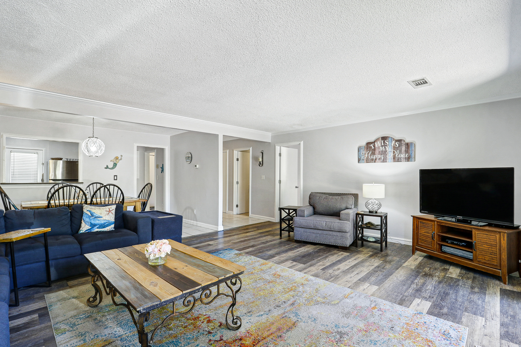 677 Queens Grant | Spacious Living room w/ TV & Deck Access