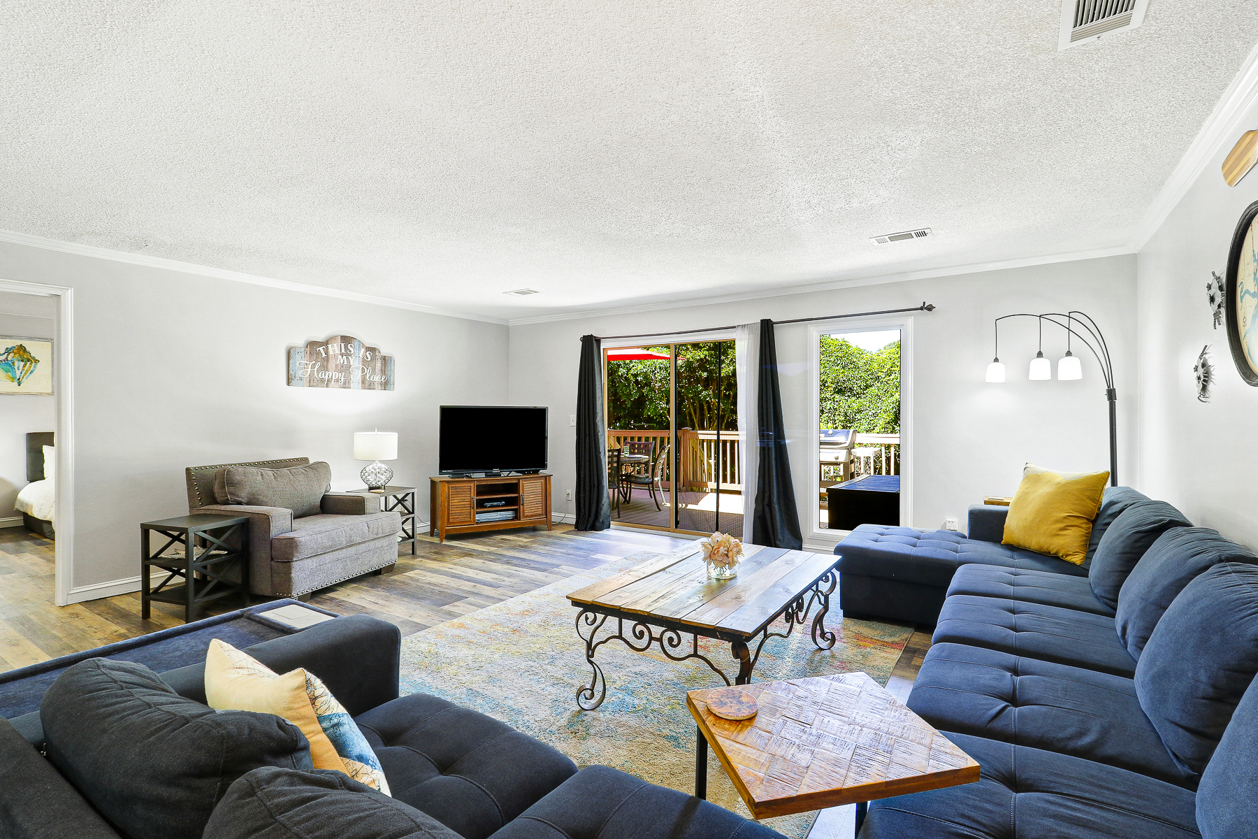 677 Queens Grant | Spacious Living room w/ TV & Deck Access