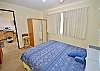 Master bedroom with queen bed
