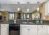 Open concept living; the kitchen, living room and dining room each has their own space, yet all together.