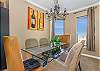 This chic dining table has seating for 6.