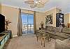 Living room also has access to the balcony.