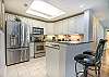 Lovely kitchen with granite and stainless steel appliances that will make meals a breeze.