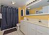 Master ensuite has a double vanity and a tub/shower combination. 