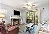 Living room with pullout sofa and access to the great back deck!