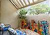 Private courtyard off the guest bedroom featuring seating for 2 and an amazing metal sculpture. 