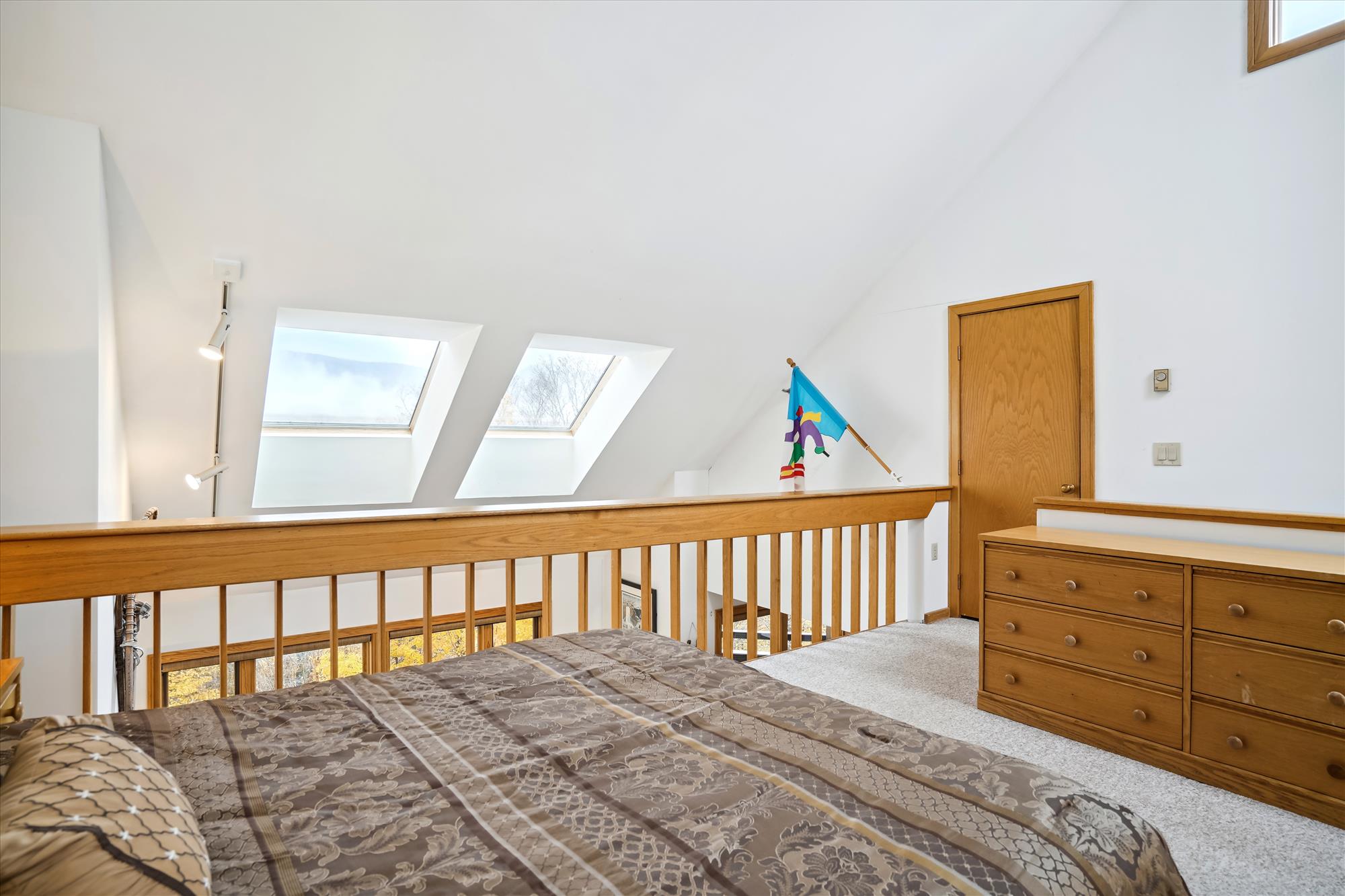 Open Loft Bedroom with Skylights