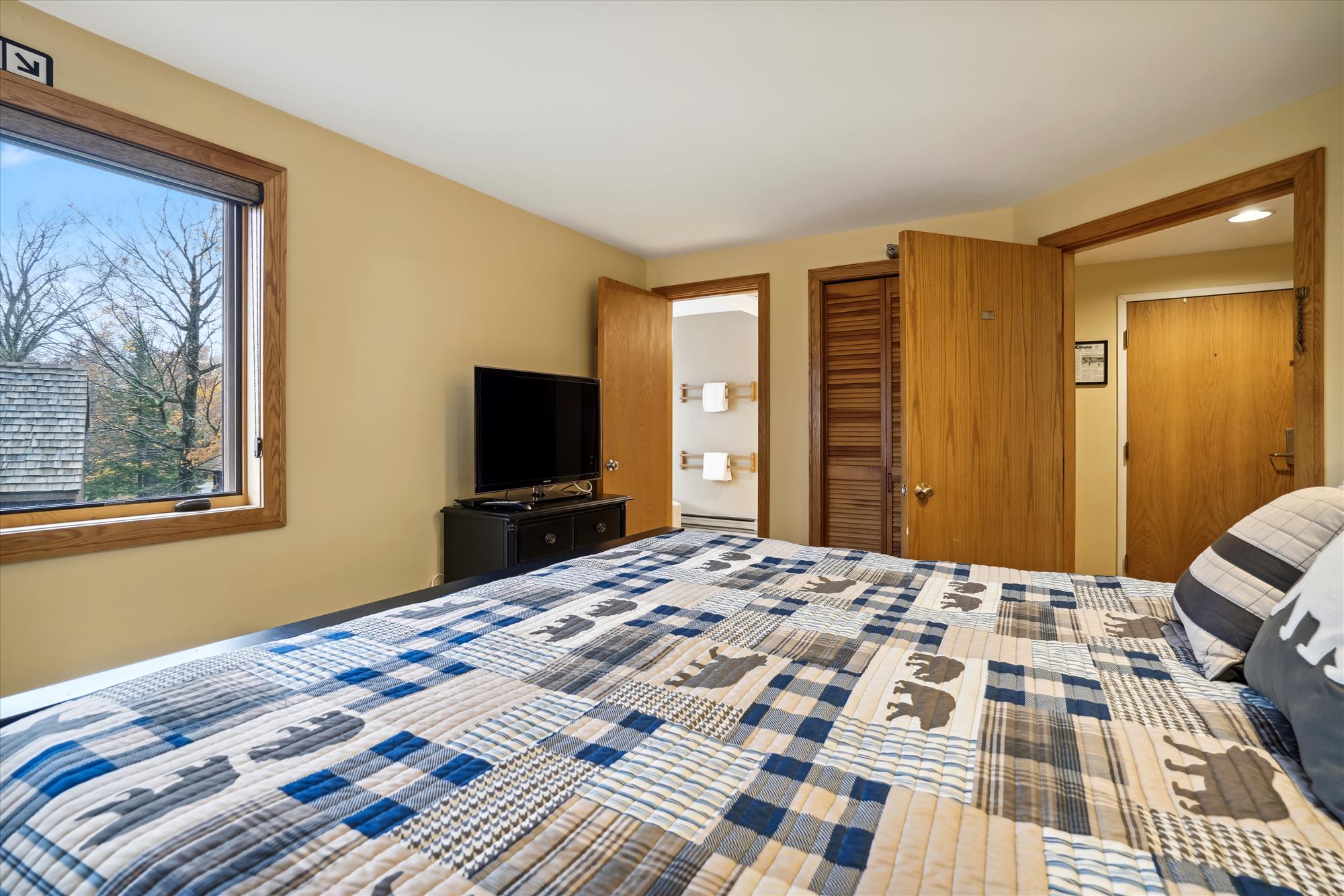Primary Bedroom with TV & Ensuite Bath