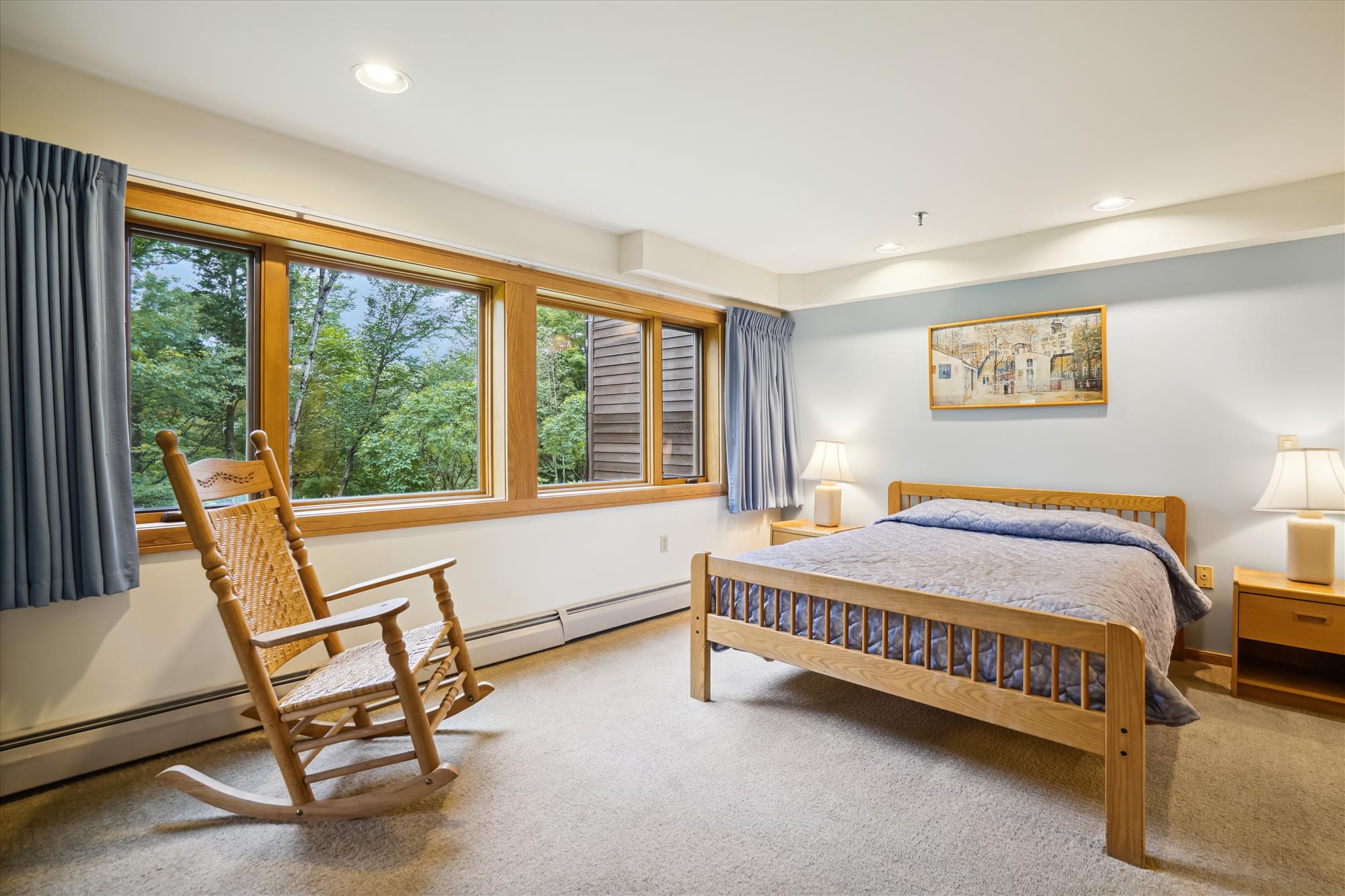 Spacious Primary Bedroom with Forest Views