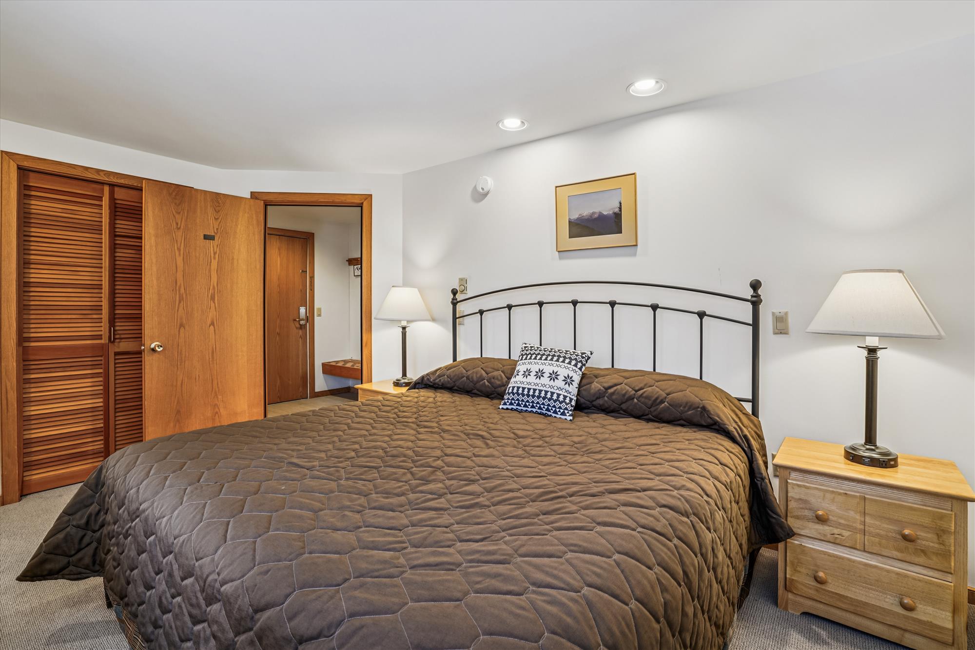 Relaxing Bedroom with Warm Wood Finishes