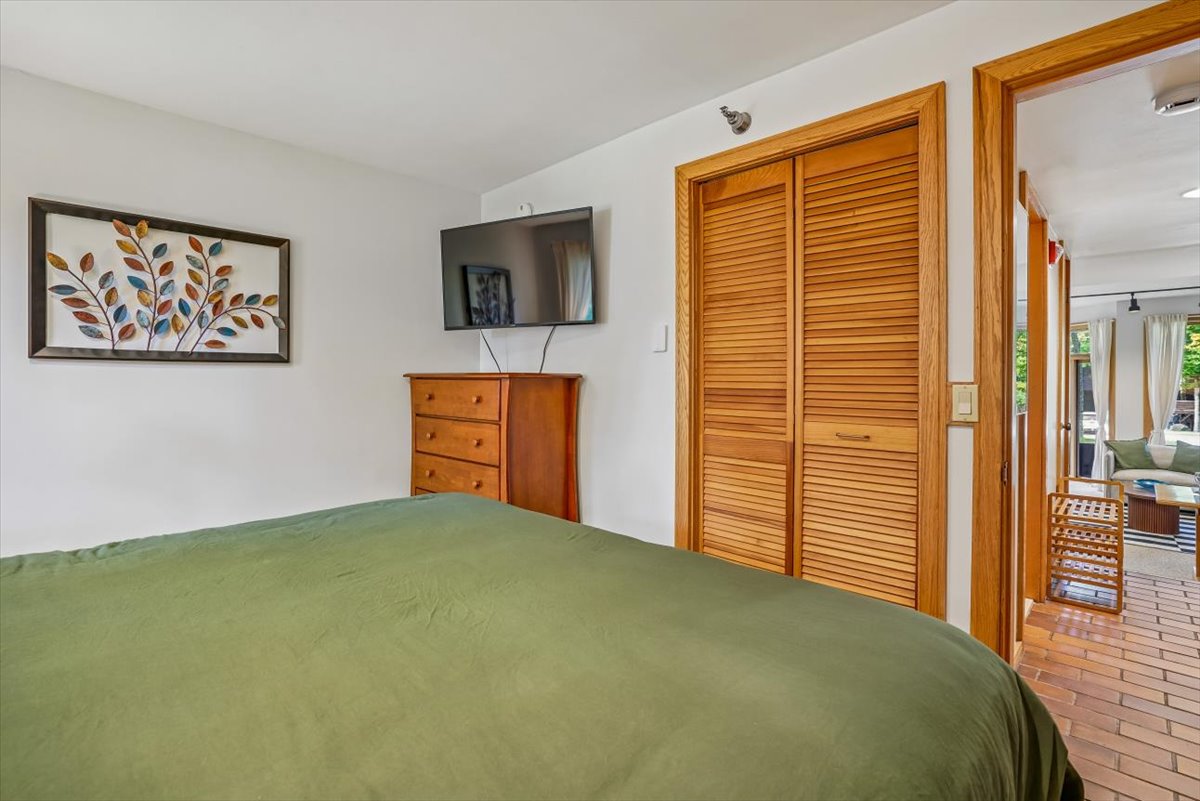 Bedroom with TV and Storage
