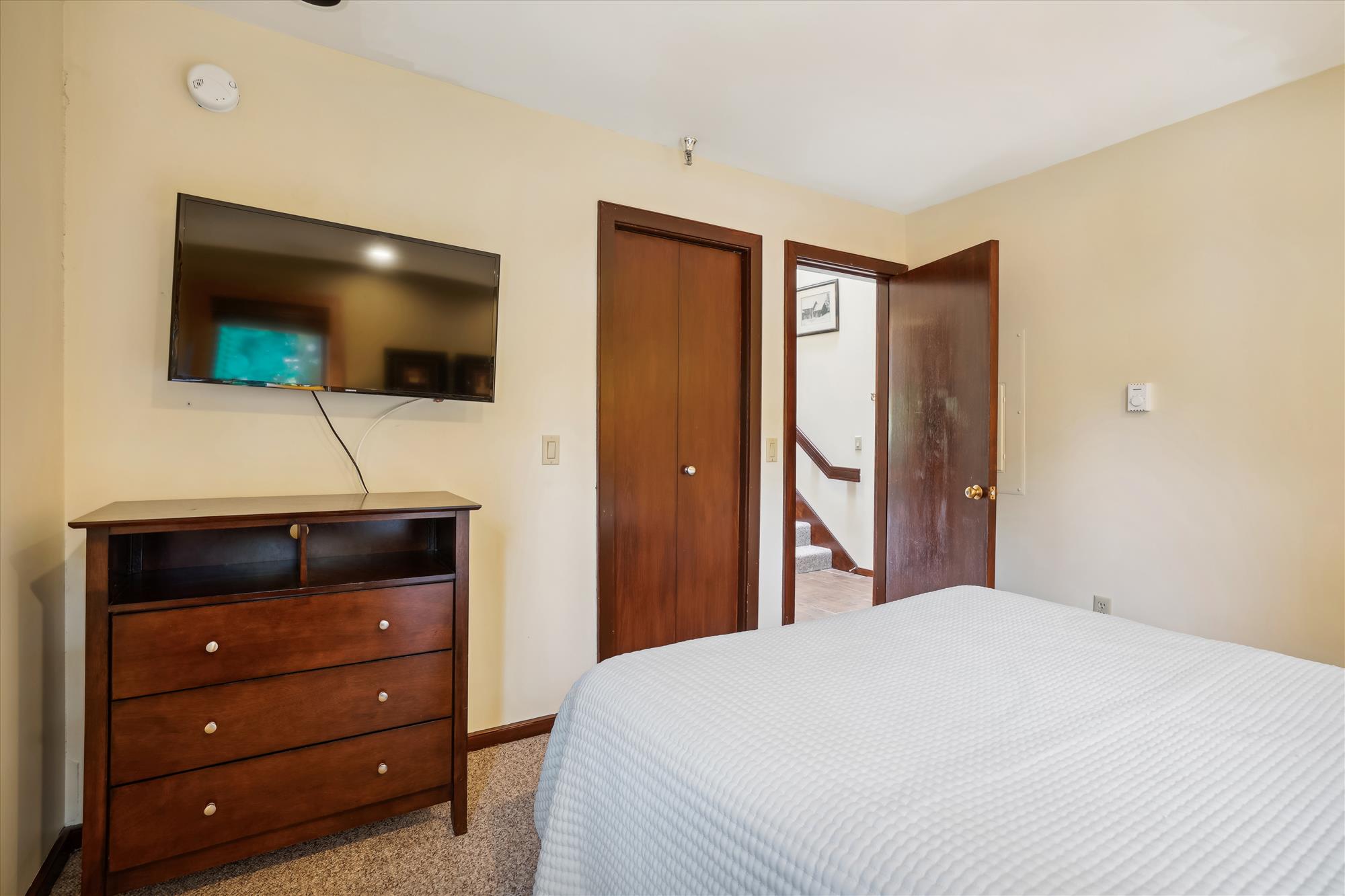 Bedroom with Dresser and Closet