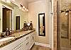 The Master Bathroom includes his and hers sinks, walk-in shower, toilet and vanity.