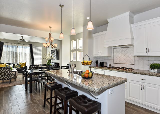 The Kitchen Island comfortably seats 3 adults and creates a great space for serving and preparing meals. 