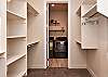 This master closet provides plenty of space for all of your luggage!