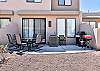 The Back Patio includes an outdoor dining table, BBQ grill, and sliding glass door that leads into the living room.