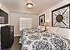 Bedroom 2 is a large bedroom which includes two queen beds, walk-in closet and private satellite TV.
