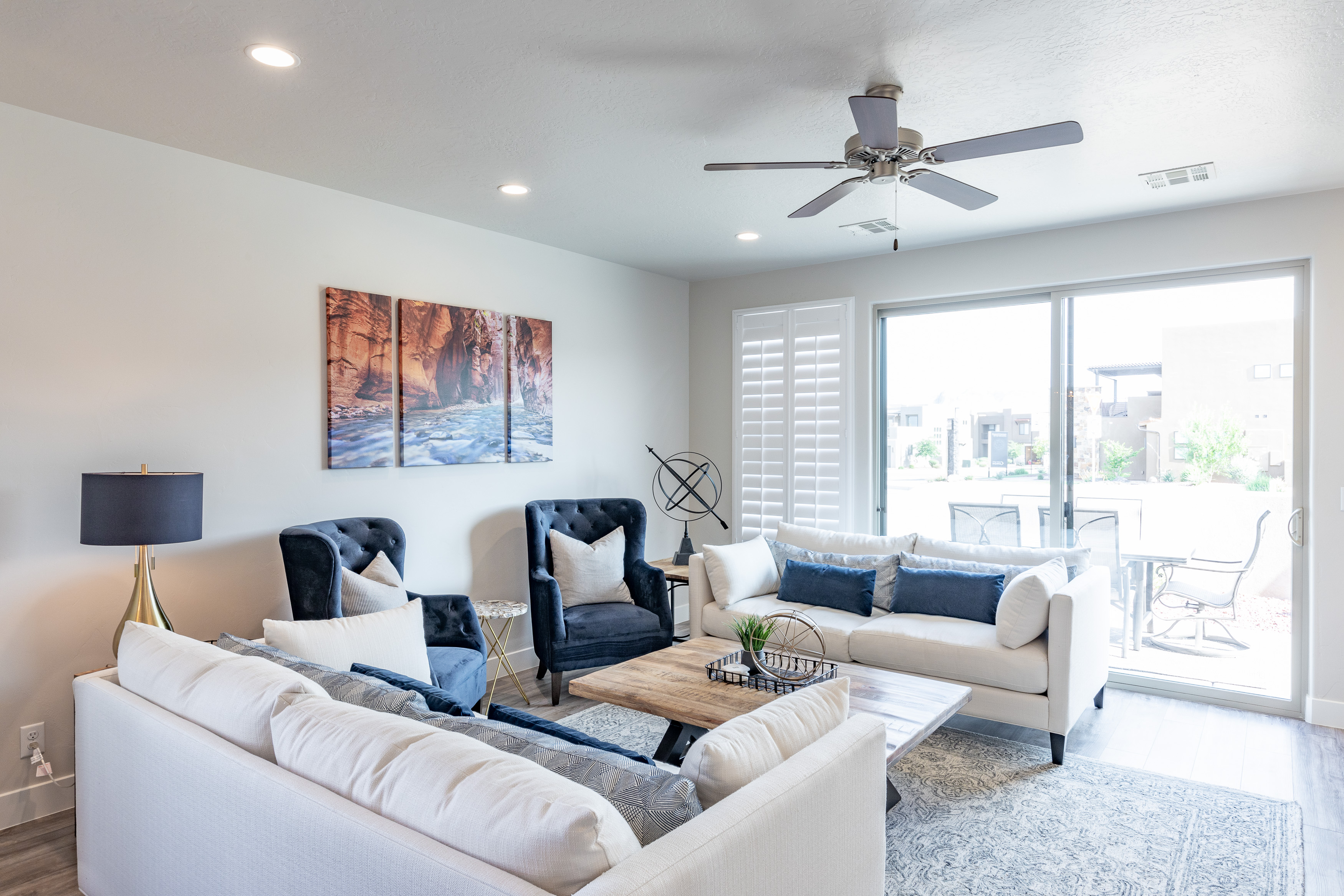 The living room is designed as an open floor plan and is a great gathering place for meals, games, or watching TV during your stay. 