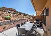 Enjoy eating outside in this secluded back patio area. 