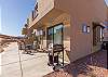 The Back Patio includes an outdoor dining table, BBQ grill, and sliding glass door that leads into the living room.