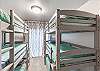 Bedroom 3 has two twin triple bunk bedsd