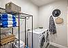 The laundry room has a washer, dryer, iron, ironing board and is stocked with laundry detergent if you desire to wash your clothes during your stay.