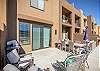 The Back Patio includes an outdoor dining table, BBQ grill, and sliding glass door that leads into the living room.