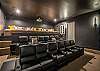 View of the theater room with plenty of seating.  The loft seating area includes 4 couch beds for maximum relaxing.