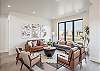 Living room seating located by the front entry way with a spectacular view
