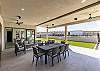 The back patio has plenty of seating for all of your guests
