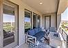 Enter this private seating area from the Main Bedroom or from the upstairs Great Room.