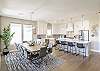 With an open and spacious floor plan, the Dining Room and Kitchen can accommodate meal preparations for groups large or small. 