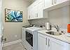 The laundry room has a washer and dryer and is stocked with laundry detergent if you desire to wash your clothes during your stay.