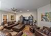 The lower level Family Room has abundant seating to watch a movie with family and friends.