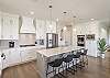 The Kitchen Island comfortably seats 4 adults and creates a great space for serving and preparing meals. 
