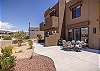 The Back Patio includes an outdoor dining table, BBQ grill, and sliding glass door that leads into the living room.