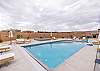 From the pool you can see the beautiful red mountains. 