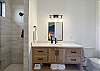 Bathroom 4 has a walk-in closet and walk-in shower.