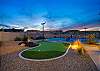 Private putting green area located in the back yard. 