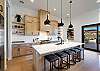 The Kitchen Island comfortably seats 5 adults and creates a great space for serving and preparing meals. 