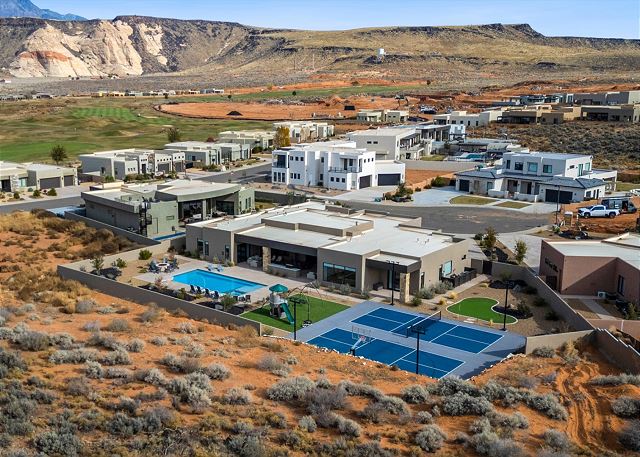 From this angle you can see the backyard and all the fun amenities available to you as well as the mountains and natural desert landscape. 