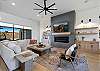 The Living Room is located adjacent to the dining room and is the perfect place to relax and watch your favorite movie or TV program.