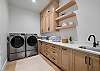 The laundry room has a washer, dryer, iron, ironing board and is stocked with laundry detergent if you desire to wash your clothes during your stay.