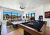This beautiful game room provides more comfortable seating and lots of activities. The sliding door allows easy access to the grill and back patio. In this room you will also find the equipment for the outdoor putting green, basketball court, and pickleball courts.
