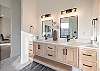 His and her sinks in the spacious main bathroom.